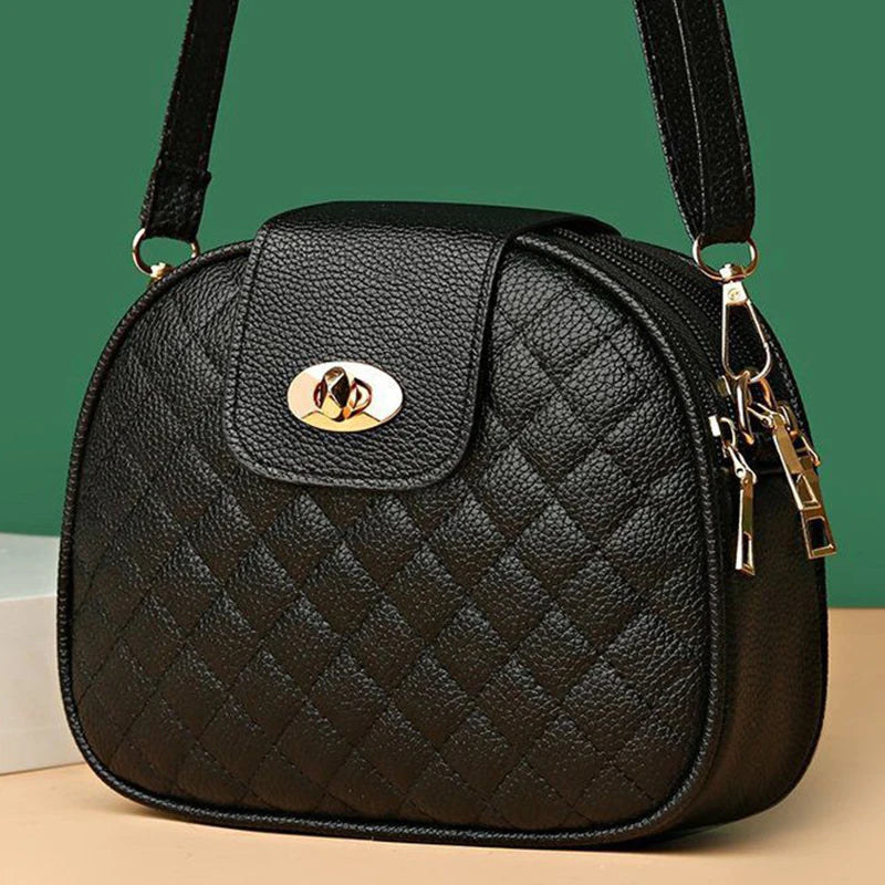 Quilted Oval Crossbody Bag