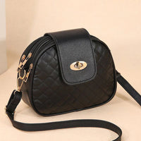 Quilted Oval Crossbody Bag