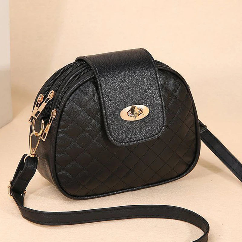 Quilted Oval Crossbody Bag