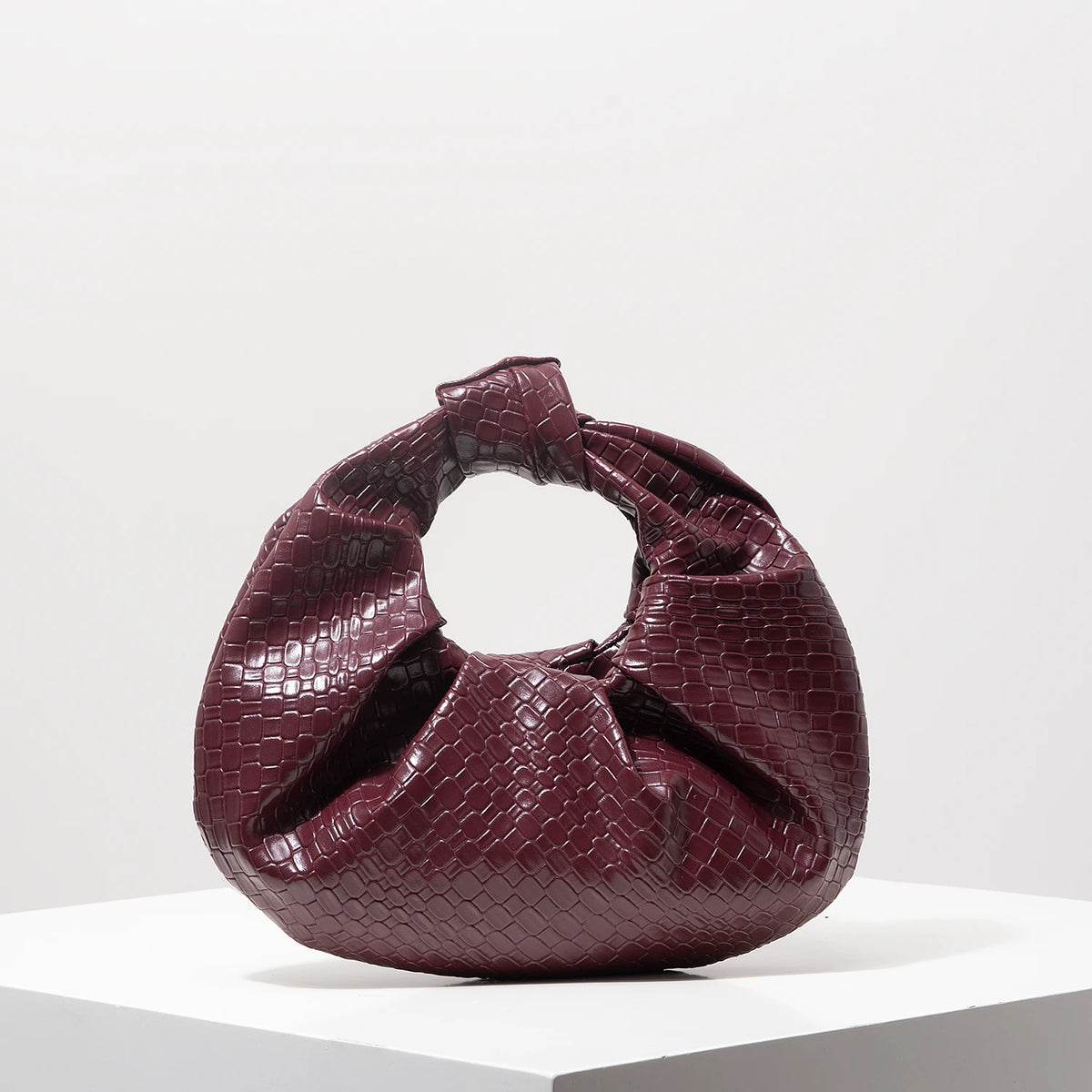 Knotted Pleated Evening Clutch