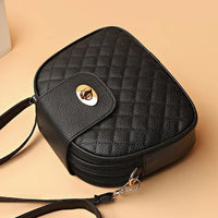 Quilted Oval Crossbody Bag