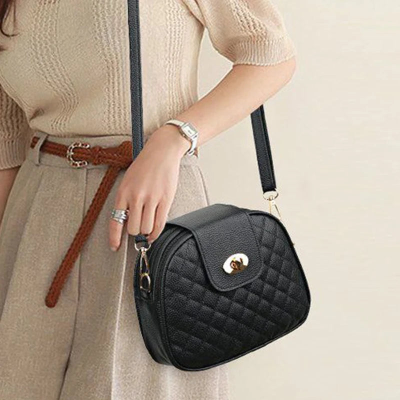 Quilted Oval Crossbody Bag