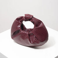 Knotted Pleated Evening Clutch