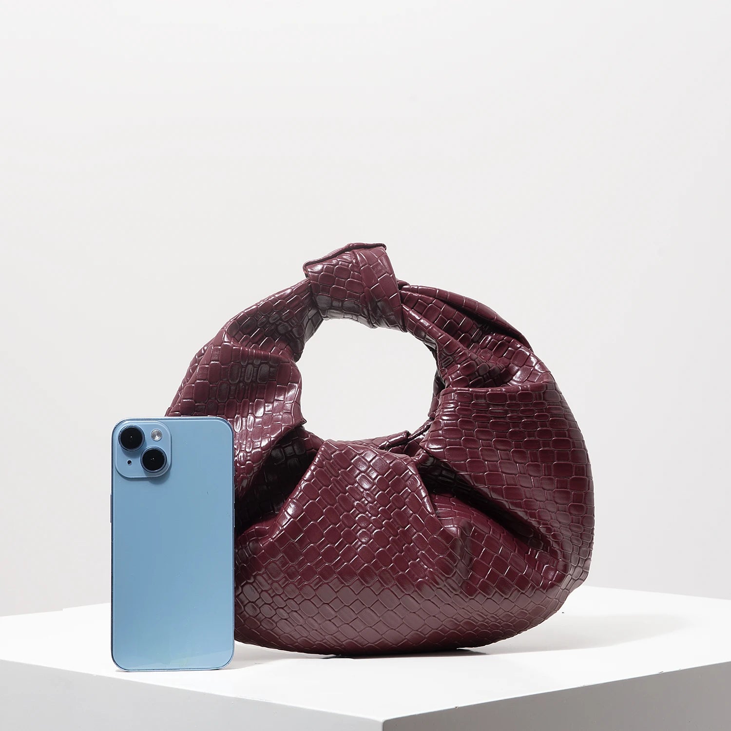 Knotted Pleated Evening Clutch